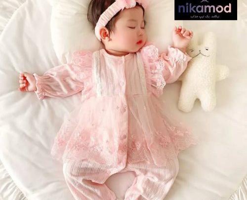 عکس نوزاد با لباس سرهمی