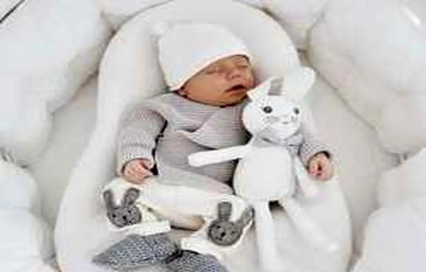 عکس نوزاد پسر با لباس سرهمی