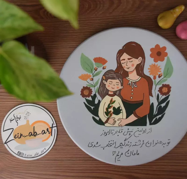 عکس تتوی مادر دختری