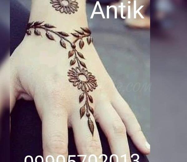 عکس تاتو حنا روی دست