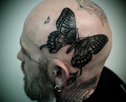 عکس تاتو پروانه روی دست مردانه