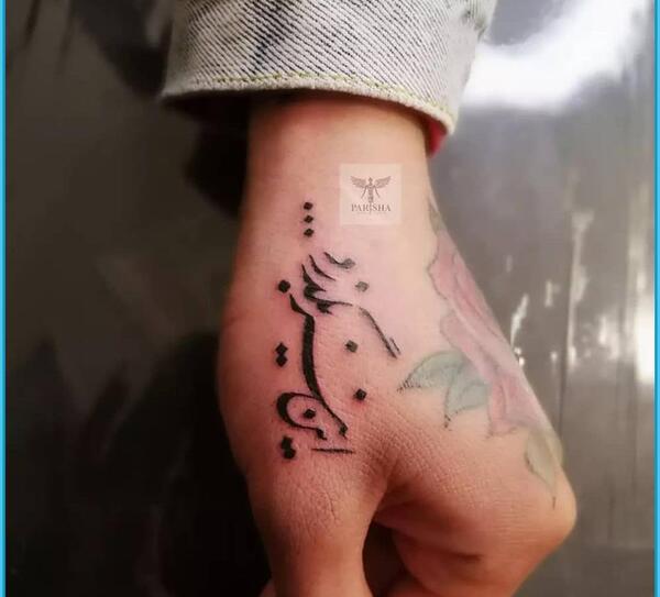 عکس تاتو روی دست مردانه نوشته فارسی