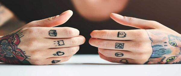 عکس تاتو زیبا روی دست مردانه