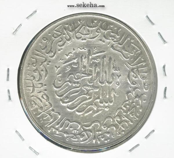 سکه قدیمی که عکس امام علی