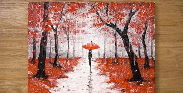 عکس نقاشی دختر در طبیعت با مداد رنگی