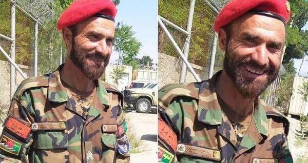 عکس احمد شاه مسعود با لباس نظامی