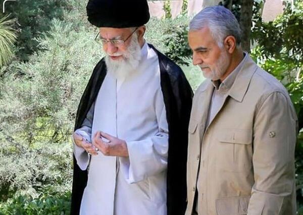 عکس رهبر رئیسی و سلیمانی