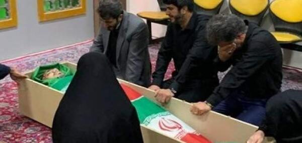 عکس مادر و کودک شهید شاهچراغ
