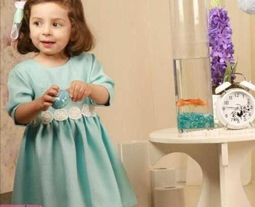 عکس دختر بچه با لباس آبی