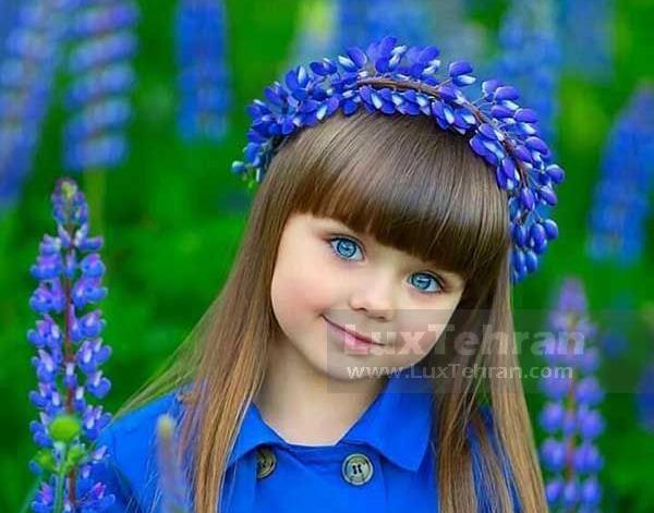 عکس دختر بچه با لباس آبی