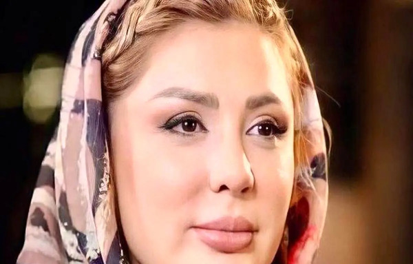 عکس دختر کرد با لباس کردی مردانه از پشت سر