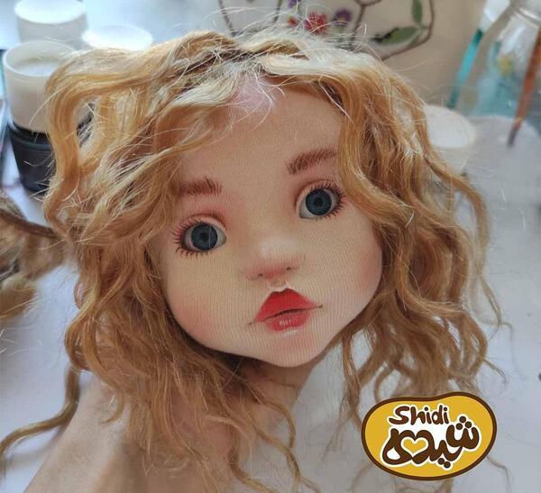 عکس نقاشی روی صورت عروسک