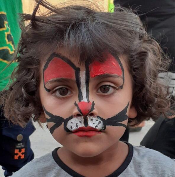عکس نقاشی روی صورت بچه