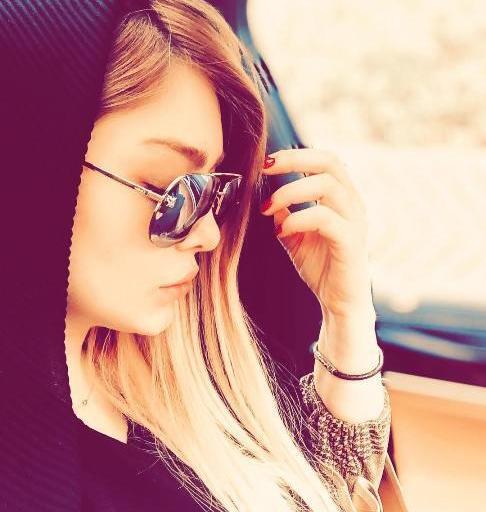 عکس زن نیمرخ با عینک دودی