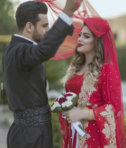 عکس زن کورد با لباس محلی