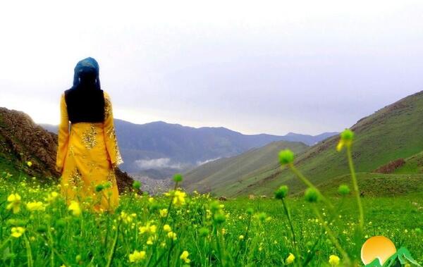 عکس زن کورد با لباس محلی