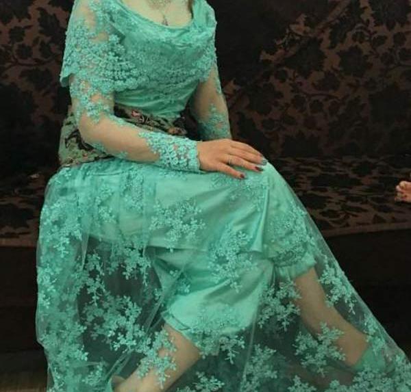 عکس زن کورد با لباس محلی