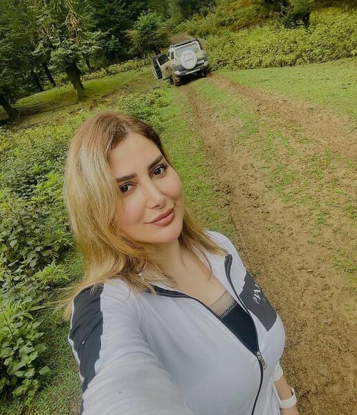 عکس زن در طبیعت شمال