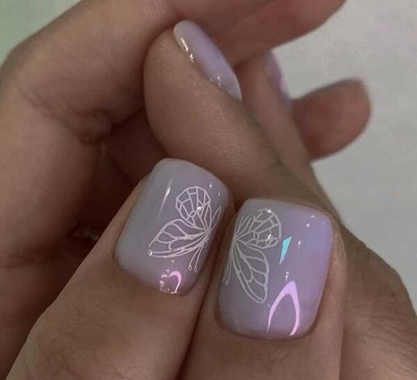 عکس کاشت ناخن طرح پروانه