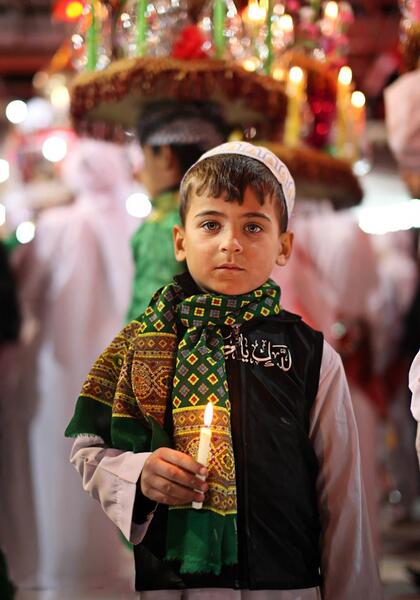 عکس بچه در حرم امام حسین