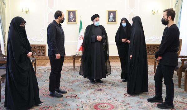 عکس شهید رئیسی و سردار سلیمانی