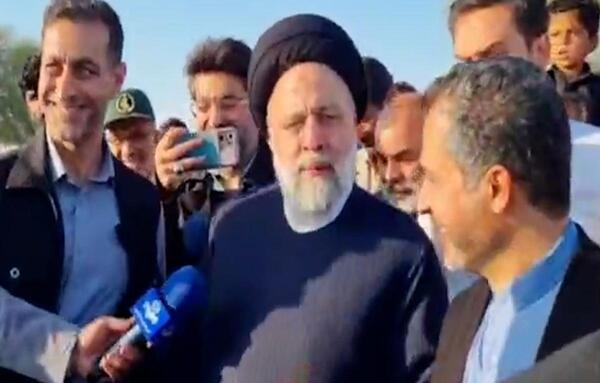 عکس شهید رئیسی در سیل