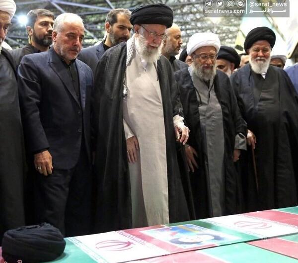 عکس شهید رئیسی با رهبری