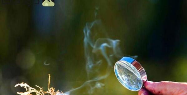 عکس سوزاندن کاغذ با ذره بین