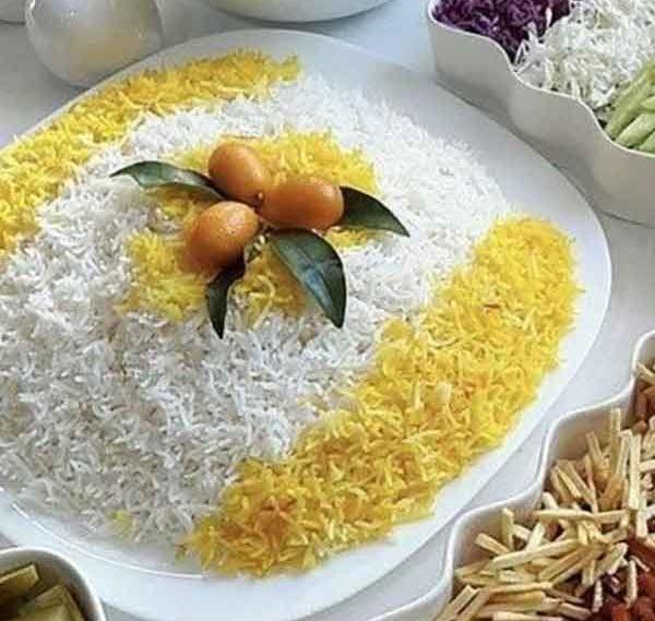 عکس تزیین برنج با زعفران و زرشک