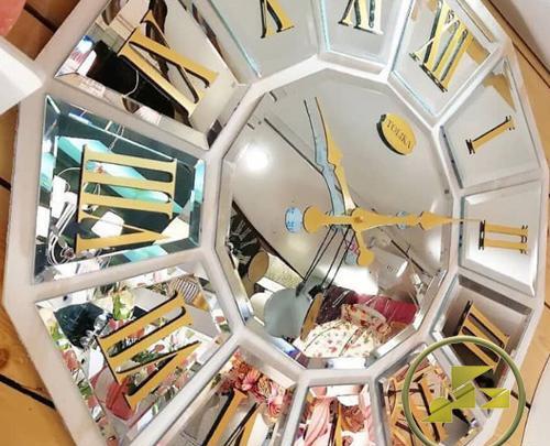 عکس ساعت آینه ای دیواری