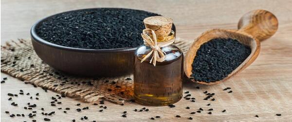 عکس روغن سیاه دانه برای مو