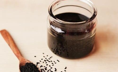 عکس روغن سیاه دانه برای مو