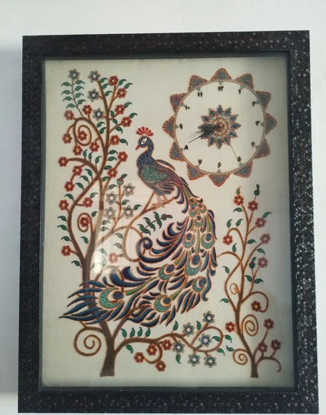 عکس پته ساعت طاووس