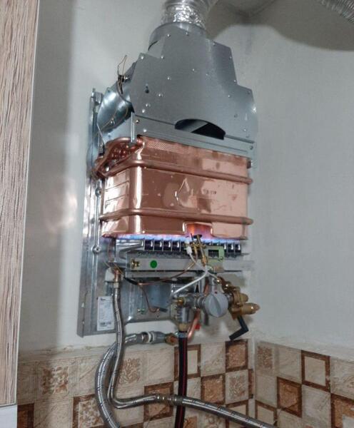 عکس نصب ابگرمکن دیواری