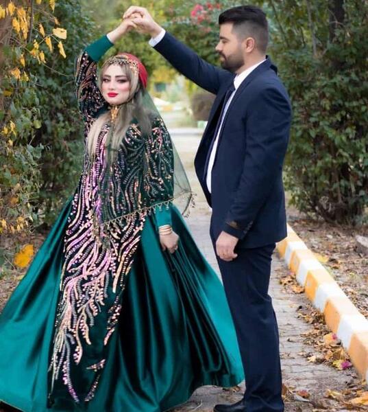 عکس عروس و داماد با لباس لری