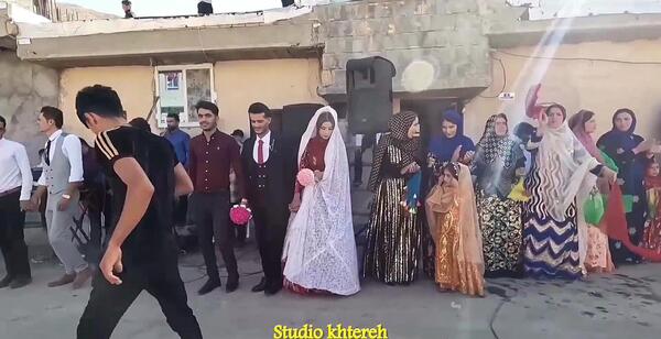 عکس عروس و داماد با لباس محلی بختیاری