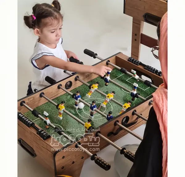 عکس کوچک ترین فوتبال دستی