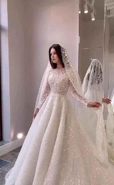 عکس لباس عروس با تور بلند
