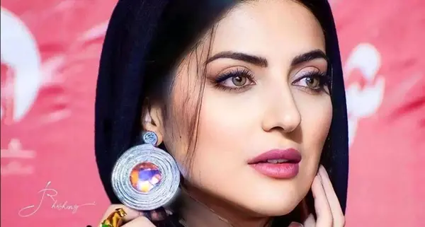 عکس پدر و مادر هلیا حسینی