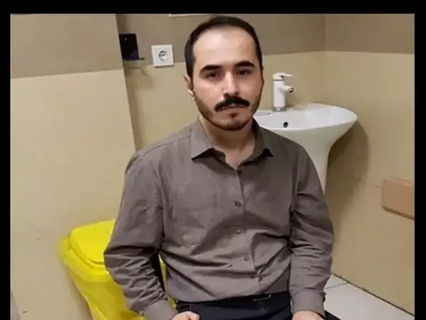 عکس لب های دوخته حسین رونقی