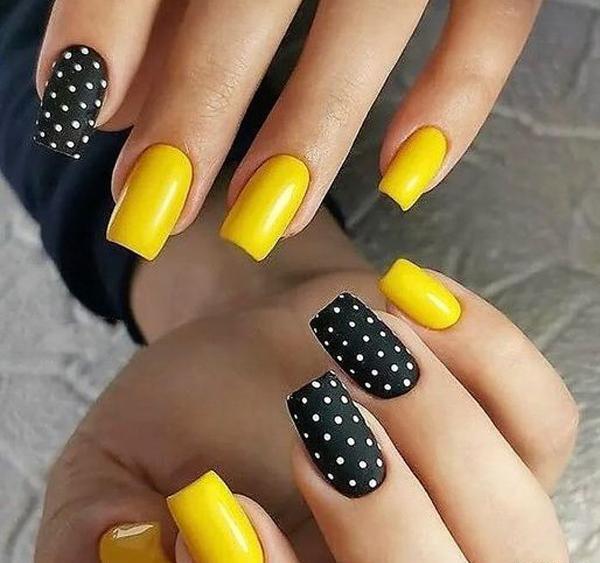 عکس طراحی ناخن با لاک زرد و مشکی
