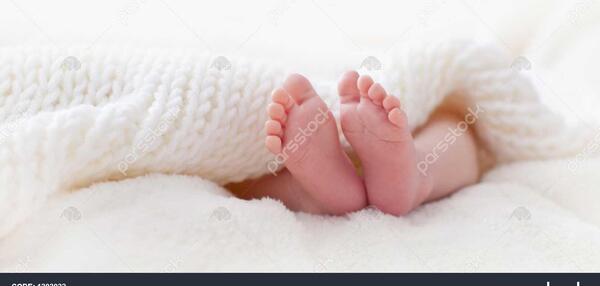 عکس پای نوزاد با نوشته