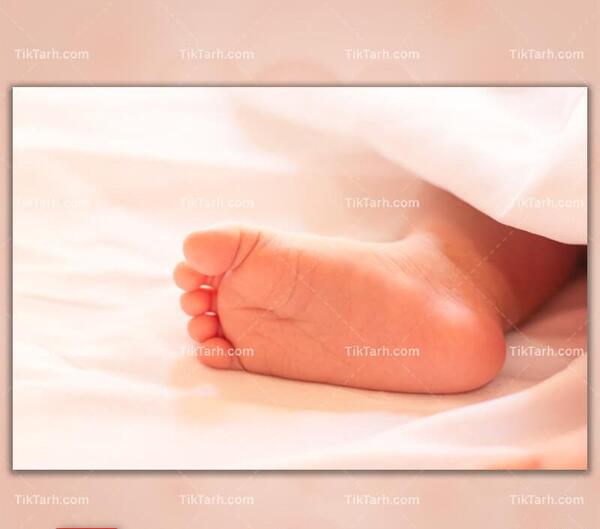 عکس پای نوزاد با نوشته