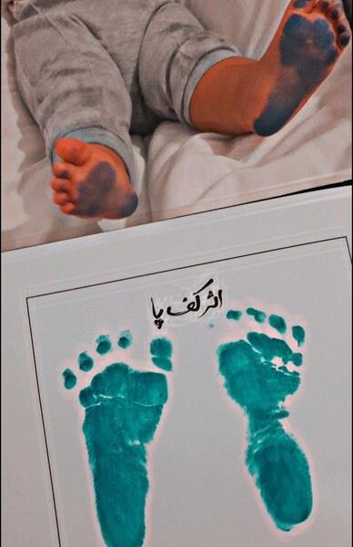 عکس پای نوزاد با نوشته