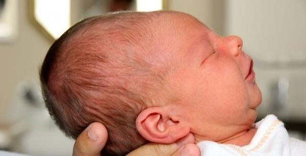 کج افتادن صورت در عکس نی نی سایت