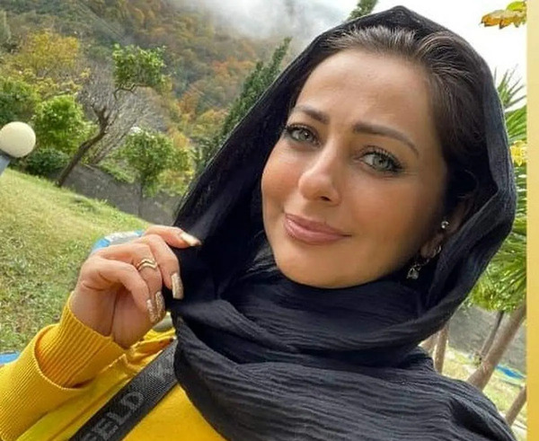 عکس بازیگر نفیسه روشن با همسرش