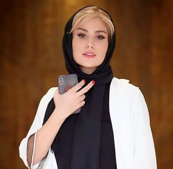 عکس بازیگر رز رضوی و همسرش