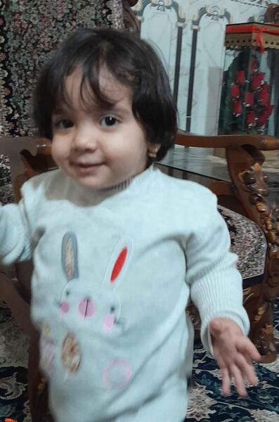 عکس واقعی کاپشن صورتی گوشواره قلبی