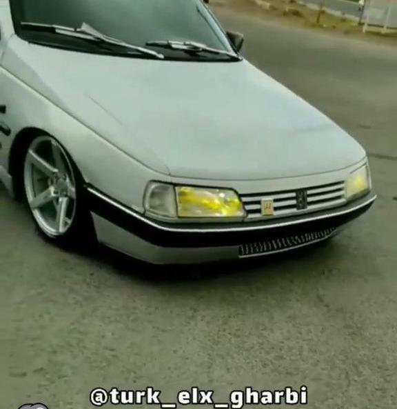 عکس پژو 405 اسپرت نقره ای شوتی