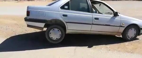 عکس پژو 405 شوتی نقره ای